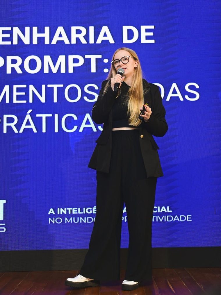 Renata Weber speaking about prompt engineering at QP Summit 2025